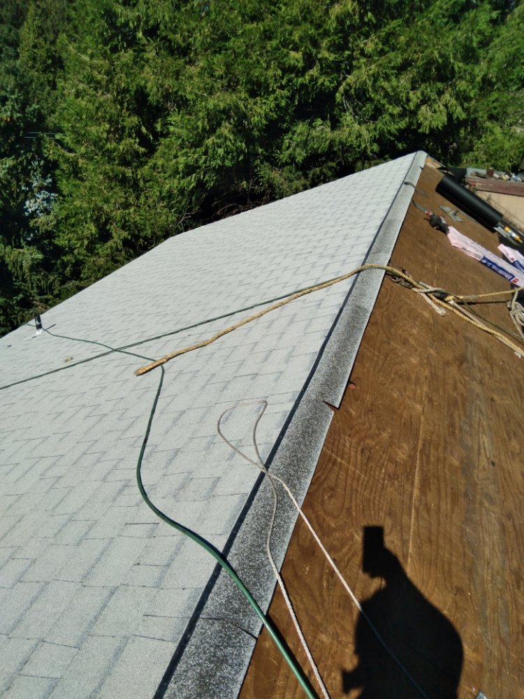 Slide of Eleazars Roofing