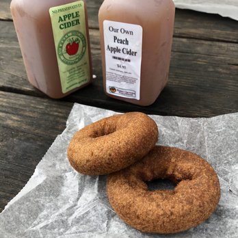 Russell Orchards - Traditional and peach apple cider paired with the best apple cider donuts! - Farmers Market Near Me - Ipswich, Massachusetts Russell Orchards - Traditional and peach apple cider paired with the best apple cider donuts! - Farmers Market Near Me - Ipswich, Massachusetts