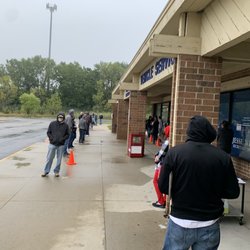 Department of Motor Vehicles - Very busy at 6:30AM, line wrapped around building.