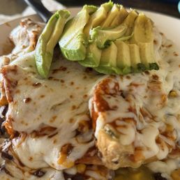 Navajo Fry Bread with chicken, corn, beans, cheese, avocado, plus red and green sauce