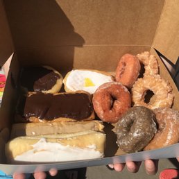 a variety of donuts in a box a variety of donuts in a box