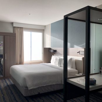 SpringHill Suites by Marriott Huntington Beach Orange County - Good reading lights over the bed and a nice desk with natural light - Hotels Near Me - Huntington Beach, California SpringHill Suites by Marriott Huntington Beach Orange County - Good reading lights over the bed and a nice desk with natural light - Hotels Near Me - Huntington Beach, California