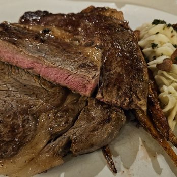 The Dining Room at Sun Mountain Lodge - Ribeye medium rare, presentation cut - New American Near Me - Winthrop, Washington The Dining Room at Sun Mountain Lodge - Ribeye medium rare, presentation cut - New American Near Me - Winthrop, Washington