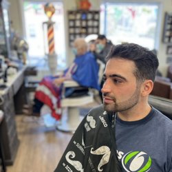 Gentleman Jack Barbershop - Wow! This haircut and beard combo is absolutely amazing!