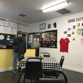 Remo's Pizzeria  - Corner counter with menu on wall. - Pizza Near Me - Eastham, Massachusetts