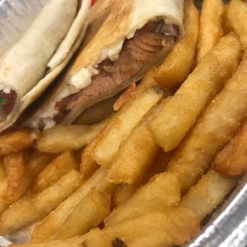 Yummy Gyro - The Salmon Wrap with French Fries - Mediterranean Near Me - Port Washington, New York Yummy Gyro - The Salmon Wrap with French Fries - Mediterranean Near Me - Port Washington, New York