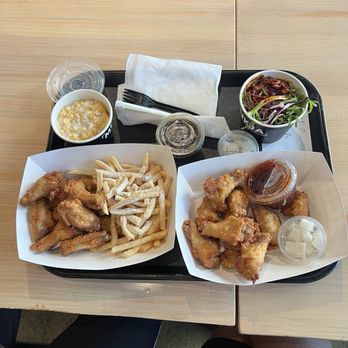 Mukja Korean Fried Chicken - 10 piece wings; (before we poured our sauces on) left: Soy Garlic, right: Sweet Heat sauce. The Cheesy Fries were a hit! - Korean Near Me - Atlanta, Georgia Mukja Korean Fried Chicken - 10 piece wings; (before we poured our sauces on) left: Soy Garlic, right: Sweet Heat sauce. The Cheesy Fries were a hit! - Korean Near Me - Atlanta, Georgia