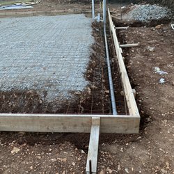 Mid America Excavating - This was the poor condition he left the slab frame structure. You can see the large gaps under the top board and there's no backfill.