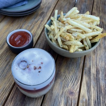 Terrene - Fries and ketchup paired with Napa Dreaming cocktail - Cocktail Bars Near Me - San Francisco, California Terrene - Fries and ketchup paired with Napa Dreaming cocktail - Cocktail Bars Near Me - San Francisco, California