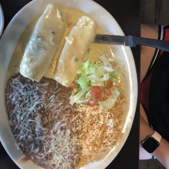 Mar Y Tierra - Cheese Enchilada covered in Queso - Mexican Near Me - Lubbock, Texas Mar Y Tierra - Cheese Enchilada covered in Queso - Mexican Near Me - Lubbock, Texas