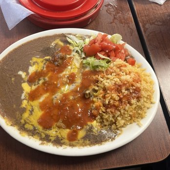Monterrey Cafe - cheese enchilada plate with their salsa on top - Mexican Near Me - New Braunfels, Texas