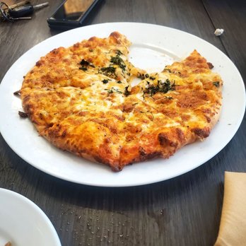 Noon Mirch - Naan Pizza - Indian Near Me - Webster, Texas Noon Mirch - Naan Pizza - Indian Near Me - Webster, Texas