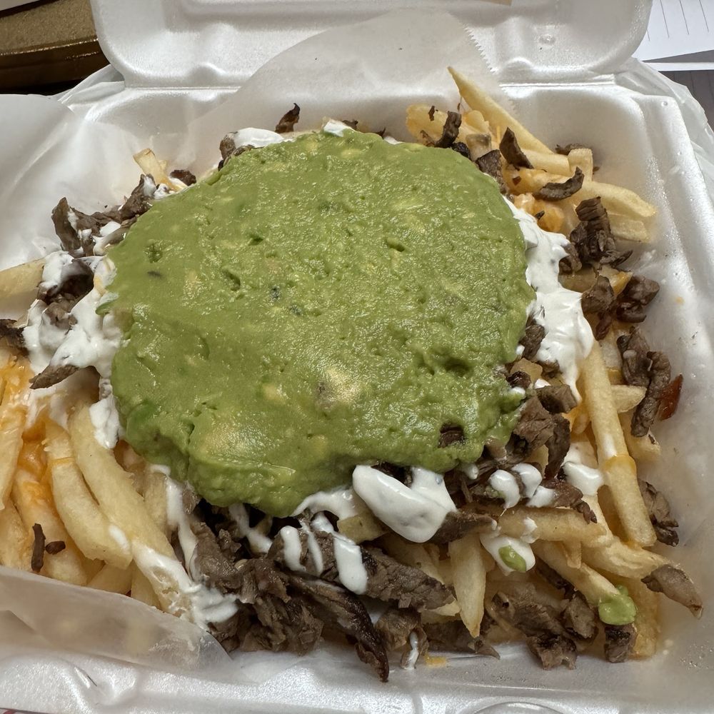 Frida’s Taqueria - Carne Asada fries with everything on it minus the salsa - Tacos Near Me - Oceanside, California Frida’s Taqueria - Carne Asada fries with everything on it minus the salsa - Tacos Near Me - Oceanside, California
