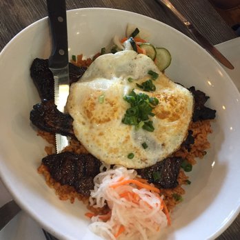 Da Kitchen Maui - Kimchee loco moco Kimchee fried rice with 3 pieces of Kalbi Ribs and 2 eggs - Hawaiian Near Me - Kihei, Hawaii Da Kitchen Maui - Kimchee loco moco Kimchee fried rice with 3 pieces of Kalbi Ribs and 2 eggs - Hawaiian Near Me - Kihei, Hawaii
