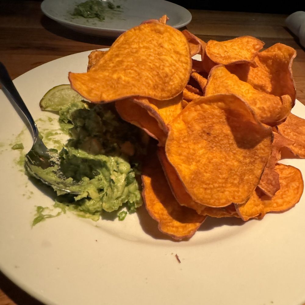 Doc B's Restaurant + Bar - Sweet potato chips with guacamole. It is a starter and at $17 it is pretty pricey Recommend having 3-4 people. - New American Near Me - Dallas, Texas Doc B's Restaurant + Bar - Sweet potato chips with guacamole. It is a starter and at $17 it is pretty pricey Recommend having 3-4 people. - New American Near Me - Dallas, Texas