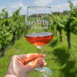 Napa Collection @ Texas Hills Vineyard  - A glass of Rosé in the vineyard at Texas Hills