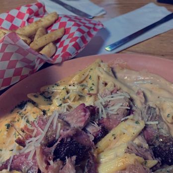 Slo' Bones BBQ Smokehaus - BBQ Pork Penne with fries. - Barbeque Near Me - Frankenmuth, Michigan