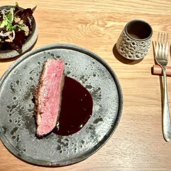 Jacaranda - Pepper Crusted Duck (roasted blueberries, wild bay; green salad, pickled shallot, crackling) w/Grilled Bones Broth; IG: @katzlundell - New American Near Me - Los Angeles, California Jacaranda - Pepper Crusted Duck (roasted blueberries, wild bay; green salad, pickled shallot, crackling) w/Grilled Bones Broth; IG: @katzlundell - New American Near Me - Los Angeles, California