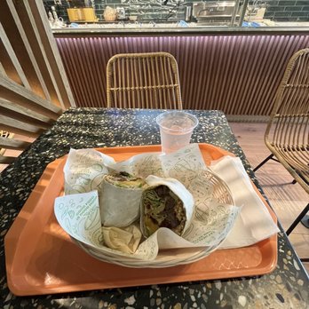 Smoothie Spot -Tamiami -  a burrito and a glass of water - Juice Bars & Smoothies Near Me - Miami, Florida
