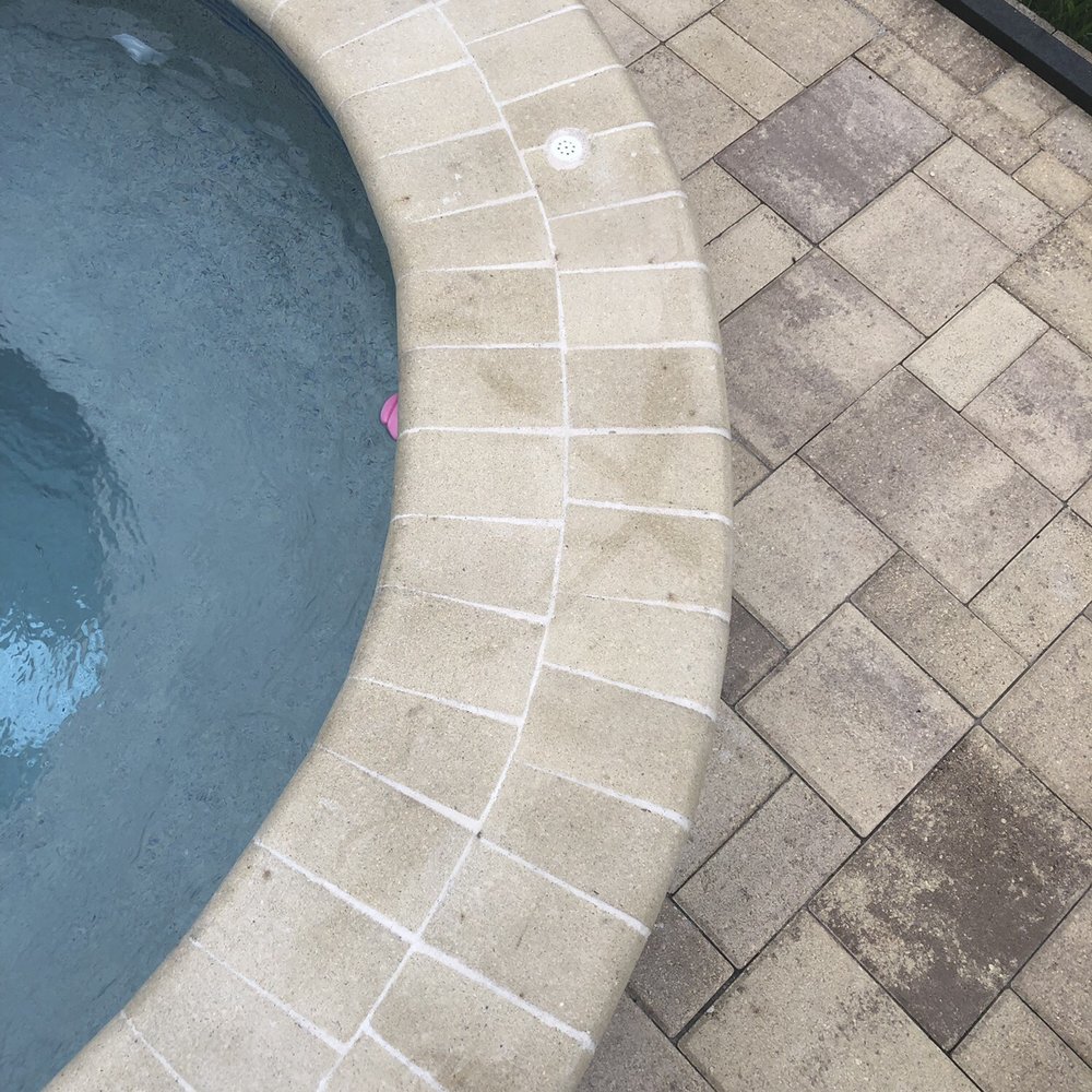 Patio Pools - More coping done by patio pools. Nothing is aligned or uniform. - Hot Tub & Pool Near Me - Tampa, Florida