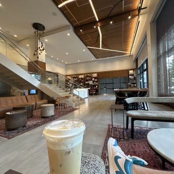 Hola Cafe - De Leche latte, more seating around bar. - Coffee & Tea Near Me - Dallas, Texas Hola Cafe - De Leche latte, more seating around bar. - Coffee & Tea Near Me - Dallas, Texas