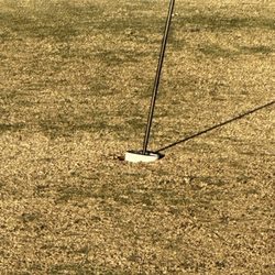 Crooked Tree Golf Course - Cup falling out of hole.