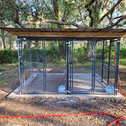Suncoast K9 Academy - Two 5' x 10' big dog kennels with a solid wall dividing them.