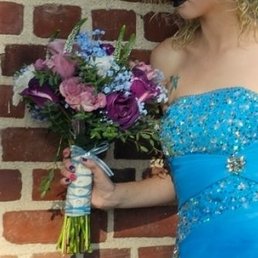 Bouquet: deep plum, mauve with greenery and hints of blue and white