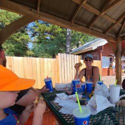Shaded seating, burgers, shakes, curly fries and more !