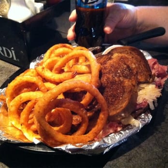 Bougey's Bar & Grill - The rueben with onion rings - American Near Me - Brookfield, Wisconsin