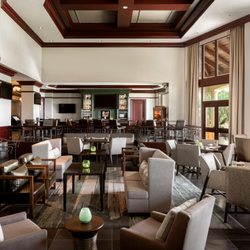 Bella Vista - A casual, inviting setting located in the lobby lounge, overlooking the 18th hole of Tiburón Golf Club.