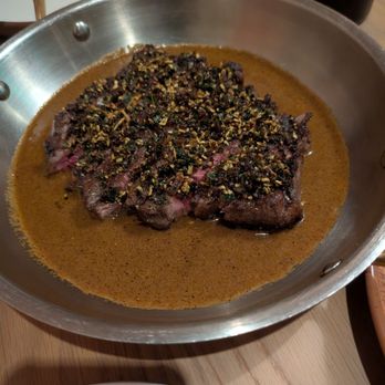 Eylan - Akaushi Wagyu Rib Eye (12 oz) - $95 Dry aged & cooked over wood fire, black pepper coconut sauce, croccolini & mint laccha paratha - Indian Near Me - Menlo Park, California Eylan - Akaushi Wagyu Rib Eye (12 oz) - $95 Dry aged & cooked over wood fire, black pepper coconut sauce, croccolini & mint laccha paratha - Indian Near Me - Menlo Park, California