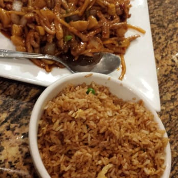 Hunan Ranch - Pork in garlic sauce with fried rice which they charged 1.00 extra since we didnt get white rice. - Chinese Near Me - Austin, Texas