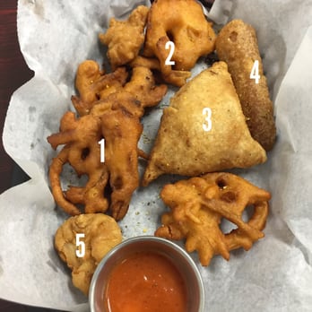 Nepali Kitchen - Appetizer Sampler. Numbers correspond to the first 5 appetizers on the menu. - Indian Near Me - Akron, Ohio