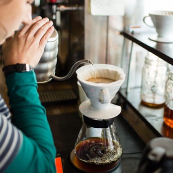Seth's Coffee - Appleton - a woman pouring coffee - Coffee & Tea Near Me - Appleton, Wisconsin Seth's Coffee - Appleton - a woman pouring coffee - Coffee & Tea Near Me - Appleton, Wisconsin