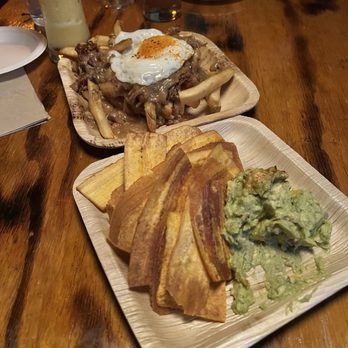 Stowaway - The moco loco fries were so good. I wish we got 2 of them. The plantain chips with guac was also perfect. - Tiki Bars Near Me - Tustin, California Stowaway - The moco loco fries were so good. I wish we got 2 of them. The plantain chips with guac was also perfect. - Tiki Bars Near Me - Tustin, California