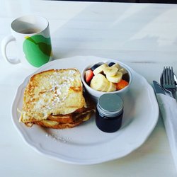 As healthy as it can be. Whole wheat French toast and cup of fruits. We will close one eye when pour the syrup