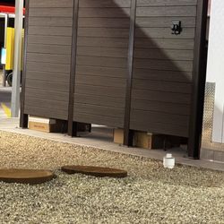 Dry storage items on floor in outside storage