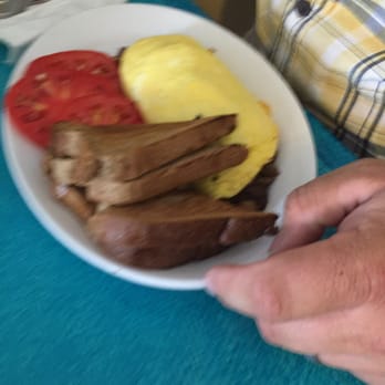 Banana River Cafe - The country omelet with fresh tomatoes and wheat toast. - Cafes Near Me - Satellite Beach, Florida