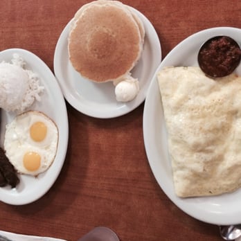 Eggs 'n Things - Huge ass veggie omelette with Portuguese sausage and pancakes ! And links with sunny side eggs and rice - Breakfast & Brunch Near Me - Honolulu, Hawaii