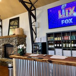 The Flipside - Bar and fireplace