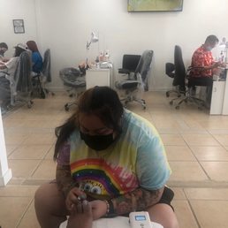 Gel polish removal in process. Gel polish removal in process.