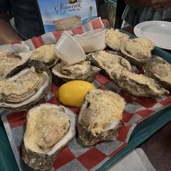 Shipwreck Raw Bar - Steamed oysters with Parmesan and garlic - Southern Near Me - Port St Joe, Florida Shipwreck Raw Bar - Steamed oysters with Parmesan and garlic - Southern Near Me - Port St Joe, Florida