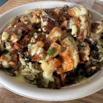 Bolay - Teriyaki chicken bowl with sweet potato and Brussels sprouts. There's sweet potato noodles and rice as the base and a turmeric sauce on top. - New American Near Me - Jupiter, Florida
