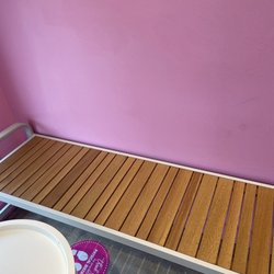 Nicky’s Doughnuts and Ice Cream - There is a bench with 2 small tables in the shop!