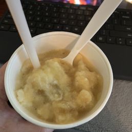 Butter beer with scoop of ice cream and topped with sweet cream