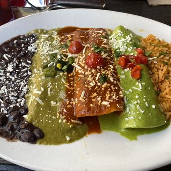 Cha Cha's Latin Kitchen - Three enchilada combo with cheese, chicken and shrimp and crab enchiladas( from left to right) - Bars Near Me - Brea, California Cha Cha's Latin Kitchen - Three enchilada combo with cheese, chicken and shrimp and crab enchiladas( from left to right) - Bars Near Me - Brea, California