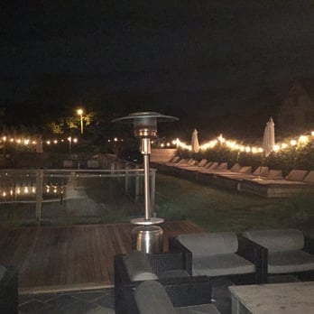Seasalt - The back yard and pool at night. - Mediterranean Near Me - Montauk, New York