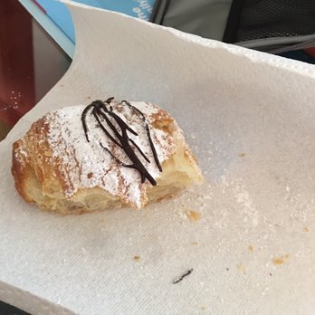 Cake Shop Cafe - Half a chocolate croissant that is the holy grail of deliciousness. - Coffee & Tea Near Me - Millbury, Massachusetts