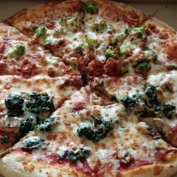 Sam's Pizza & Subs - Half bacon with broccoili and the other half with spinach and mushrooms. - Pizza Near Me - Stafford, Virginia Sam's Pizza & Subs - Half bacon with broccoili and the other half with spinach and mushrooms. - Pizza Near Me - Stafford, Virginia